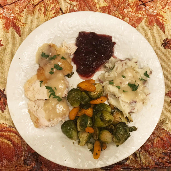 Full plate showing a Thanksgiving meal